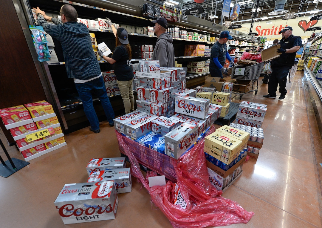 (Francisco Kjolseth  |  The Salt Lake Tribune)  Distribution crews fill the shelves at Smith's Food and Drug in Woods Cross with beer that is 5% alcohol by volume on Friday, Nov. 1, 2019, for the first time in 86 years.