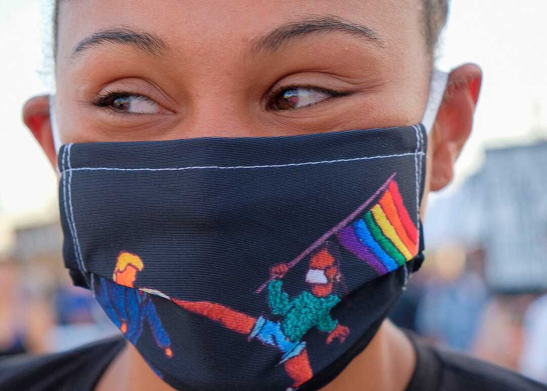 (Leah Hogsten  |  The Salt Lake Tribune) Rae Duckworth sports her handmade mask. Five days after after nine protesters were arrested during a peaceful rally in memory of Zane James that turned into a violent clash with Cottonwood Heights officers, demonstrators gathered outside the police station Friday to denounce CHPD's actions and its officers for inciting the violence.