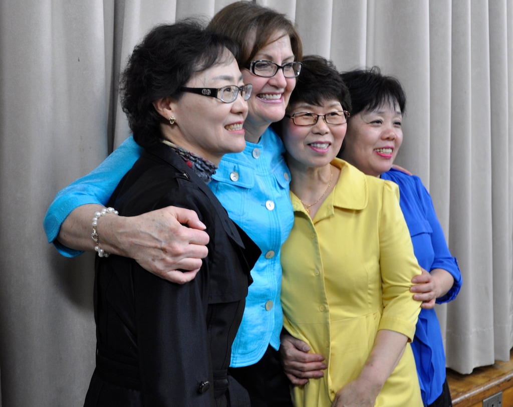 (The Church of Jesus Christ of Latter-day Saints) South Korean Latter-day Saints greet then-Relief Society President Linda K. Burton in 2014.