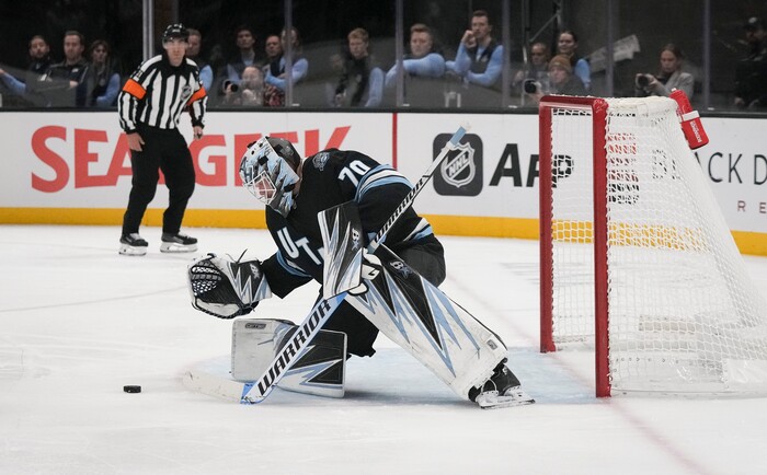 (Bethany Baker | The Salt Lake Tribune) Utah Hockey Club goaltender Karel Vejmelka (70) blocks a shot during the game between the Utah Hockey Club and the Colorado Avalanche at the Delta Center in Salt Lake City on Thursday, Oct. 24, 2024.