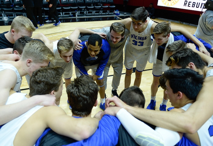 (Francisco Kjolseth  |  The Salt Lake Tribune)  Weber vs Pleasant Grove, 6A State high school basketball tournament at the Huntsman Center in Salt Lake City, Thursday March 1, 2018. Pleasant Grove players gather before the start of their game against Weber. 