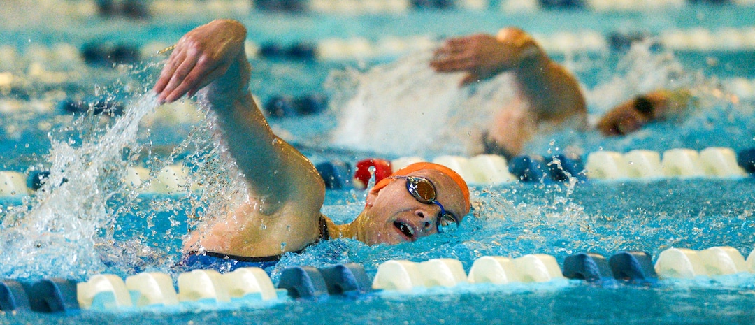 (Leah Hogsten  |  The Salt Lake Tribune)  Brighton's Rachel Butler and Maple Mountain's Makayla Cazier battle it out in the 500 yard freestyle at the Class 5A State Championships in Bountiful, Saturday, February 10, 2018. 