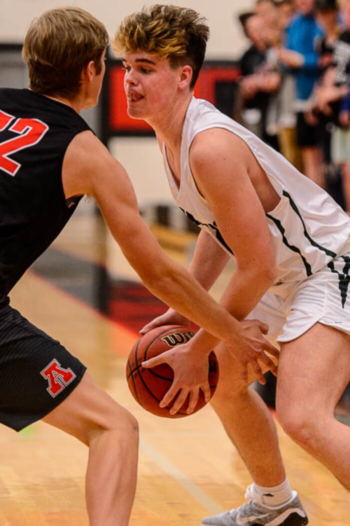 (Trent Nelson | The Salt Lake Tribune)  Olympus's Caden Kuhn looks to shoot as American Fork hosts Olympus in the Utah Elite Eight tournament, Saturday December 9, 2017.