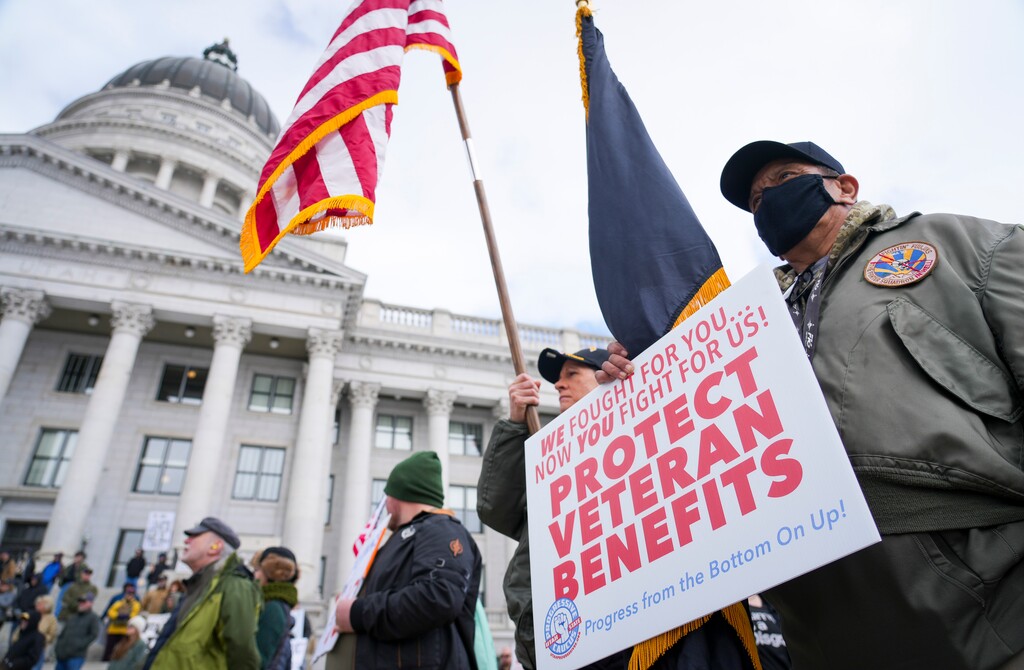 (Bethany Baker  |  The Salt Lake Tribune) Veterans and supporters gather at the Utah Capitol in Salt Lake City for a protest in response to Trump administration policies on Friday, March 14, 2025.