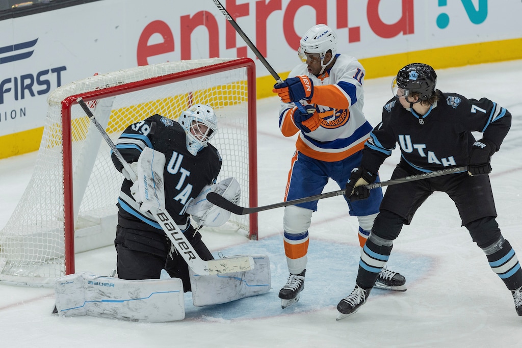 (Melissa Majchrzak | AP) Utah Hockey Club goaltender Connor Ingram (39) and defenseman Michael Kesselring (7) blocks the goal against New York Islanders left wing Anthony Duclair (11) during the third period of an NHL hockey game Saturday, Jan. 11, 2025, in Salt Lake City.