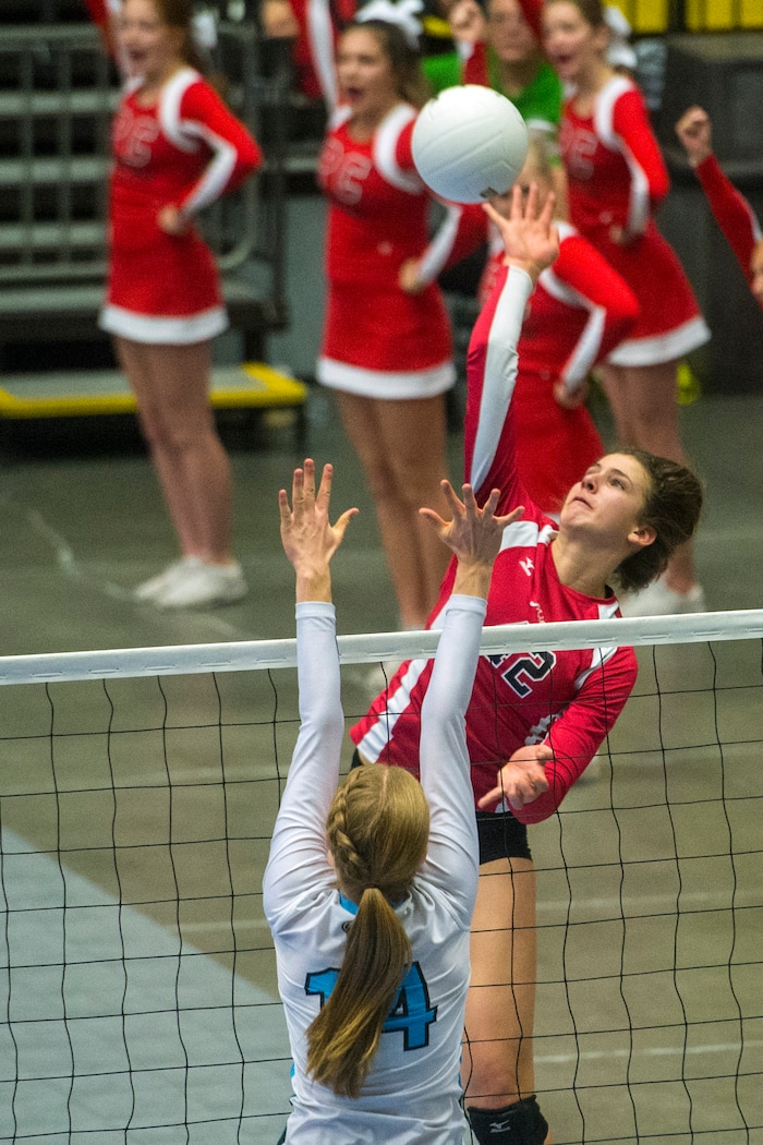 (Chris Detrick  |  The Salt Lake Tribune)  Park City's Grace Wiczek (42) spikes past Sky View's Kristen Schumann (14) during the the 4A volleyball state championships at the UCCU Center at Utah Valley University Thursday, October 26, 2017.  