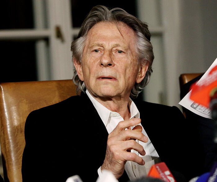 FILE - In this Oct. 30, 2015, file photo, filmmaker Roman Polanski tells reporters he can "breath with relief" after a Polish judge ruled that the law forbids his extradition to the U.S., where in 1977 he pleaded guilty to having sex with a minor, in Krakow, Poland. A Los Angeles judge has denied the impassioned plea of Roman Polanski's victim to end the criminal case against the fugitive director. Judge Scott Gordon ruled Friday, Aug. 18, 2017,  Polanski must appear in a Los Angeles court if he expects to have his four-decade-old case resolved.   (AP Photo/Jarek Praszkiewicz, File)
