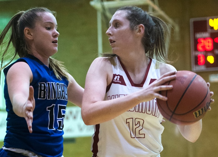 (Rick Egan  |  The Salt Lake Tribune)     Maggie McCord (15) Bingham, defends, Mercedes Staples (12) Viewmont, in prep basketball action, Bingham vs. Viewmont, in Bountiful, Wednesday, January 3, 2018.