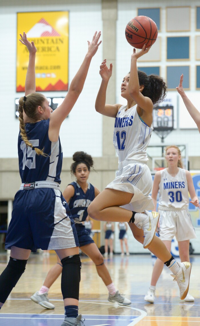 (Leah Hogsten  |  The Salt Lake Tribune)  Bingham's Ameleya Angilau (12) had 10 points. Bingham's Ameleya Angilau (12) drives to the net. Bingham defeated Copper Hills 48-40 in their semifinal game of the 6A High School Girls' Basketball Tournament at SLCC in Taylorsville, Friday, Feb. 23, 2018. 