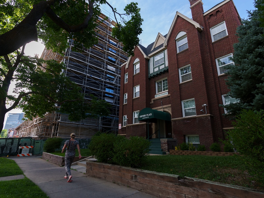 (Leah Hogsten | The Salt Lake Tribune) The Oxford Place Apartments on 300 South in the shadow of The Cottonwood apartment complex, Tuesday, July 12, 2022. A new study says gentrification is rampant across Salt Lake City, with new development and rising rents squeezing out existing residents and cherished businesses and leaving no affordable neighborhoods in terms of housing.