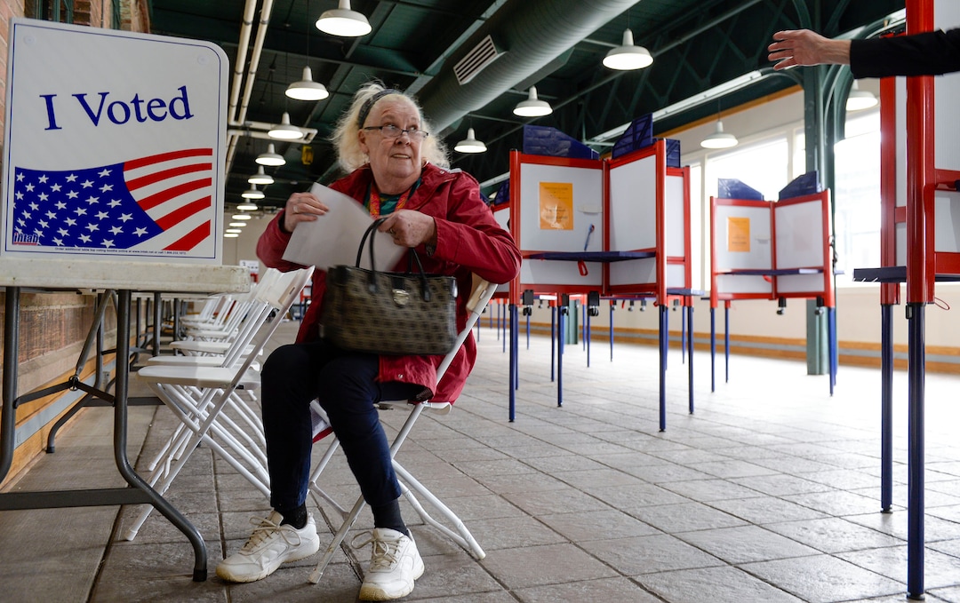 (Leah Hogsten  |  The Salt Lake Tribune) Margaret Collins of Ogden casts her ballot at Ogden's Union Station during Utah's Super Tuesday primary, Mar. 3, 2020,