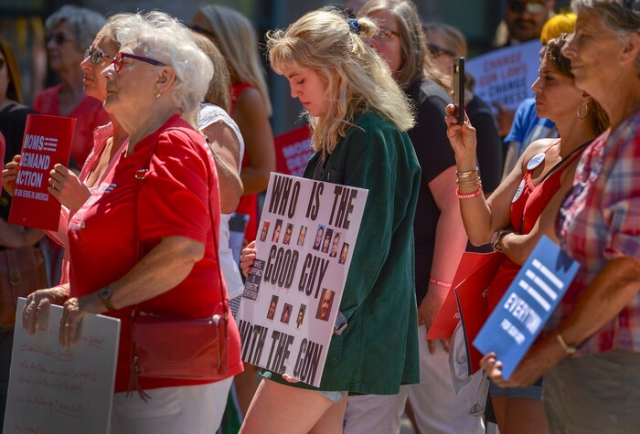 (Leah Hogsten  |  The Salt Lake Tribune) Samantha Skipper, center, joined the rally to honor of her best friend, who lost her father and a 15-year-old family friend to gun violence.  Members of Moms Demand Action for Gun Sense in America gathered at Washington Square Park to demand change in gun laws in reaction to the August mass shootings in Dayton, Ohio and El Paso, Texas, and the hundreds of Americans who are wounded and killed by gun violence every day.
