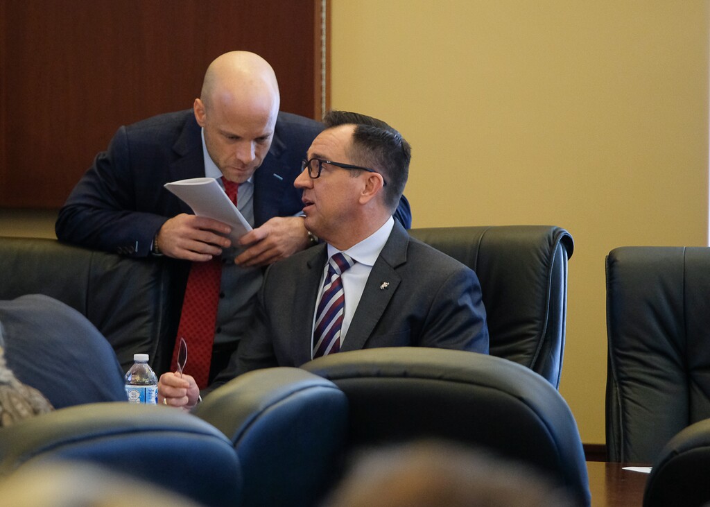 (Francisco Kjolseth  | Tribune file photo) House Speaker Greg Hughes, right, speaks with his chief of staff Greg Hartley prior to a caucus meeting on day two of the 2018 legislative session on Tuesday, Jan. 23, 2018.