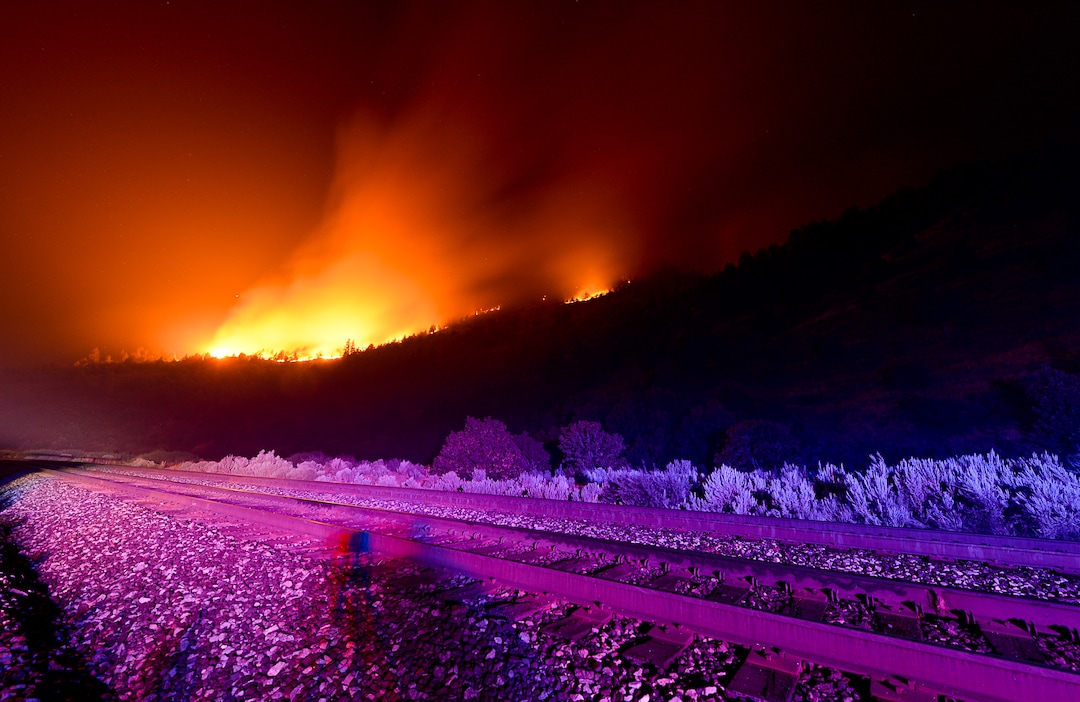 (Francisco Kjolseth  |  The Salt Lake Tribune)  The Coal Hollow Fire continues to grow as it burns along Highway 6 in Utah County on Thursday night Aug. 9, 2018.