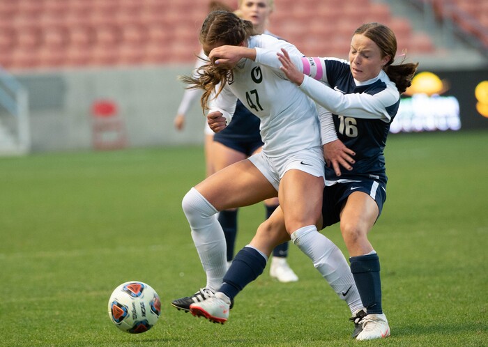 (Francisco Kjolseth  |  The Salt Lake Tribune) Sofia Ward #47 of Olympus battles Summer Diamond #16 of Bonneville as they compete in their 5A high school girls championship game at Rio Tinto Stadium in Sandy on Friday, Oct. 23, 2020. Bonneville went on to win 1-0 in overtime.