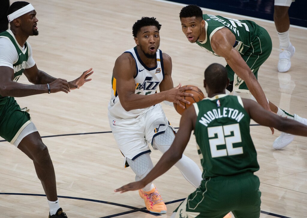 (Francisco Kjolseth  | The Salt Lake Tribune) Utah Jazz guard Donovan Mitchell (45) looks for an opening as the Utah Jazz take on the Milwaukee Bucks at Vivint Smart Home Arena in Salt Lake City, on Friday, Feb. 12, 2021.