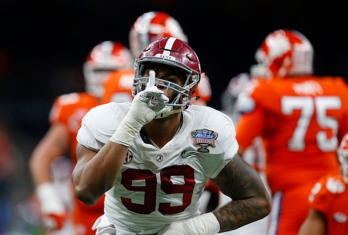 Alabama defensive lineman Raekwon Davis (99) gestures after a stop in the first half of the Sugar Bowl semi-final playoff game against Clemson for the NCAA college football national championship, in New Orleans, Monday, Jan. 1, 2018. (AP Photo/Butch Dill)