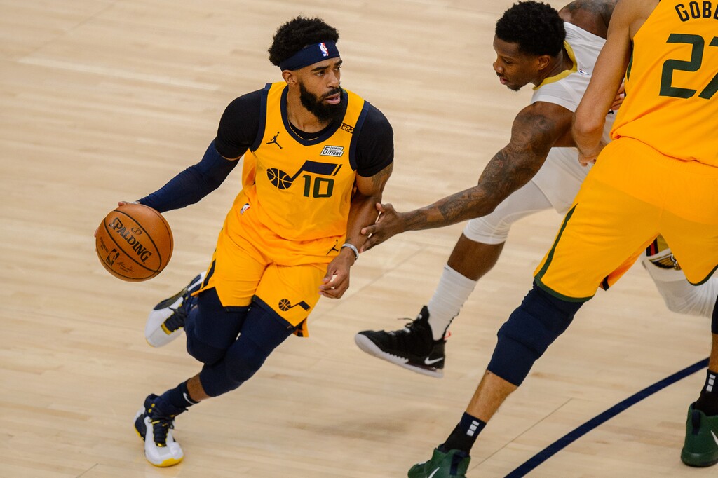 (Trent Nelson  |  The Salt Lake Tribune) Utah Jazz guard Mike Conley (10) defended by New Orleans Pelicans guard Eric Bledsoe (5) as the Utah Jazz host the New Orleans Pelicans, NBA basketball in Salt Lake City on Tuesday, Jan. 19, 2021.