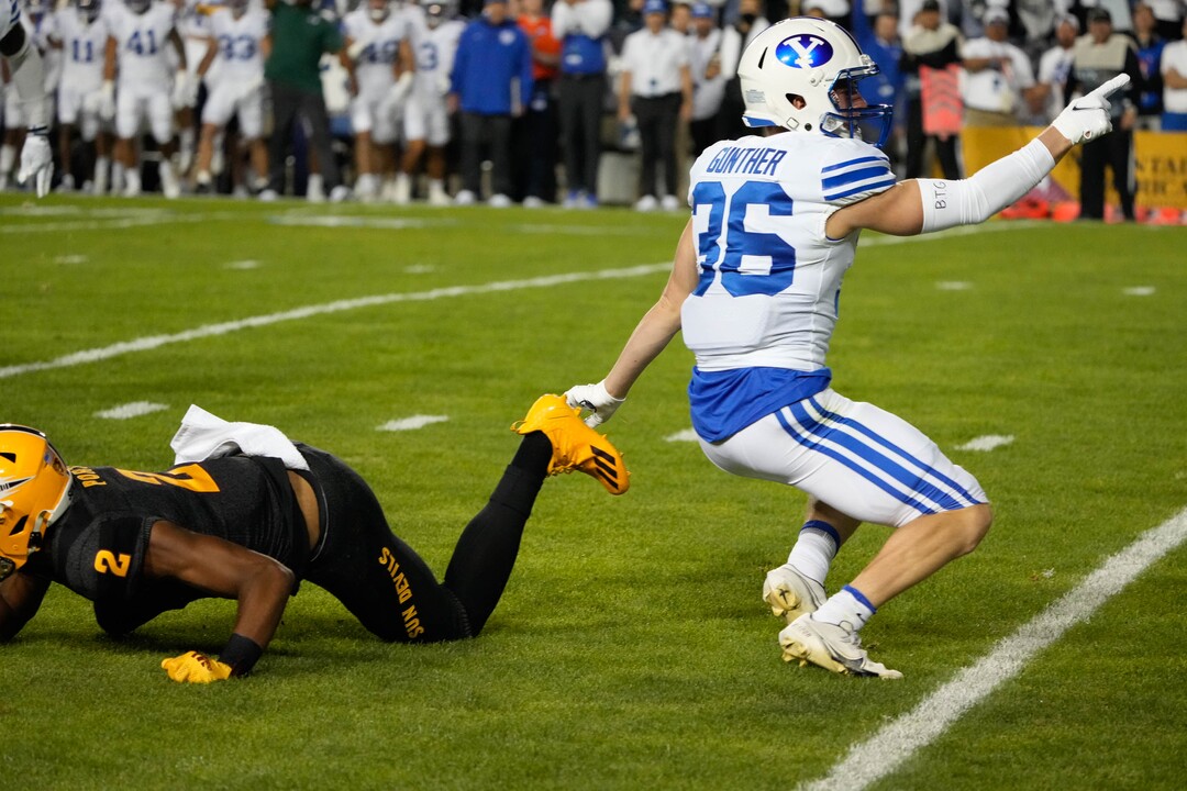 (Francisco Kjolseth | The Salt Lake Tribune) Arizona State Sun Devils wide receiver Geordon Porter (2) is taken down by Brigham Young Cougars wide receiver Talmage Gunther to force a fumble on a kick return at the start of the game in game action between the Brigham Young Cougars and the Arizona State Sun Devils at LaVell Edwards Stadium in Provo, on Saturday, Sept. 18, 2021.