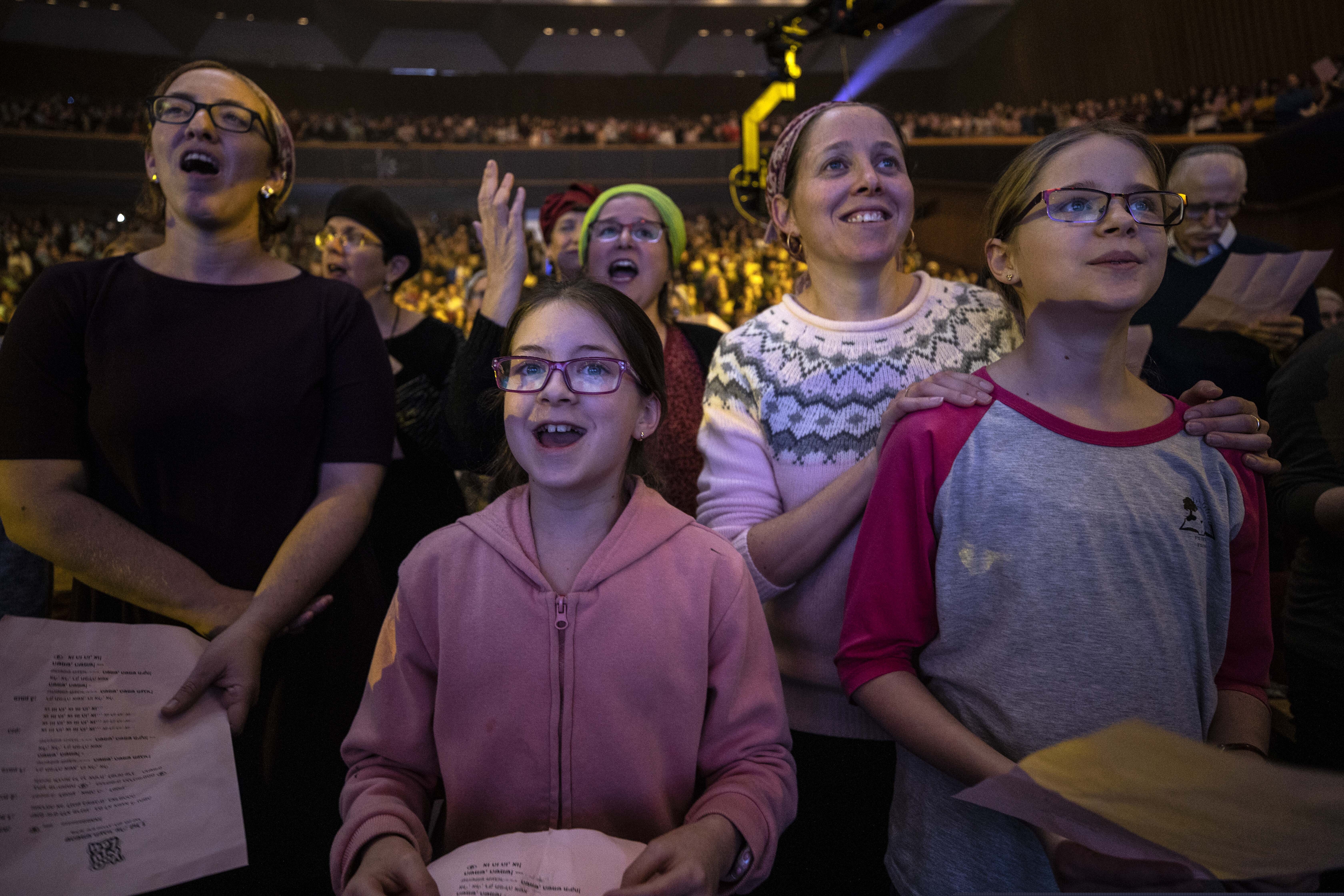 (Tsafrir Abayov | AP Photo) In this Sunday, Jan. 5, 2020 photo, Jewish Orthodox women attend an event celebrating the completion of the 71/2-year cycle of daily study of the Talmud, in Jerusalem. 