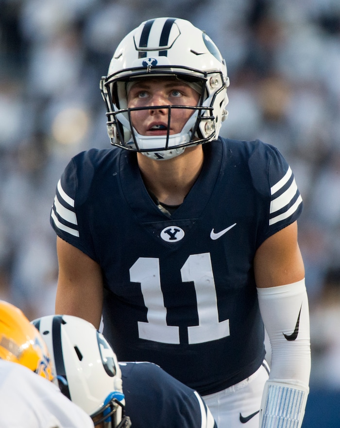 (Rick Egan  |  The Salt Lake Tribune)    Brigham Young Cougars quarterback Zach Wilson (11) looks at the clock before taking a knee on the 5 yardline instead of trying to score in the final minute of the game as the Brigham Young Cougars led the McNeese State Cowboys 30-3, at Lavell Edwards Stadium, Saturday, Sept. 22, 2018.


