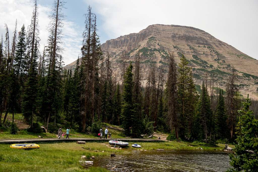 (Leah Hogsten  |  The Salt Lake Tribune)  Visitors to Mirror Lake walk the path around the lake, August 6, 2017. Bald Mountain is in the background. 