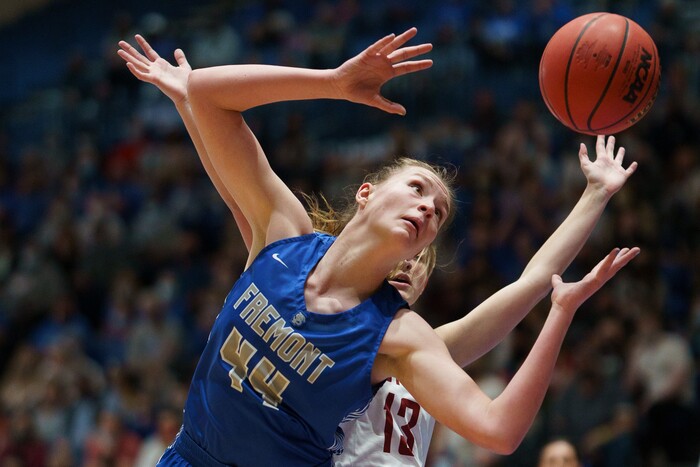 (Trent Nelson  |  The Salt Lake Tribune) Fremont's Maggie Mendelson reaches for a loose ball while facing Herriman in the 6A girls basketball state championship game, in Taylorsville on Saturday, March 6, 2021.