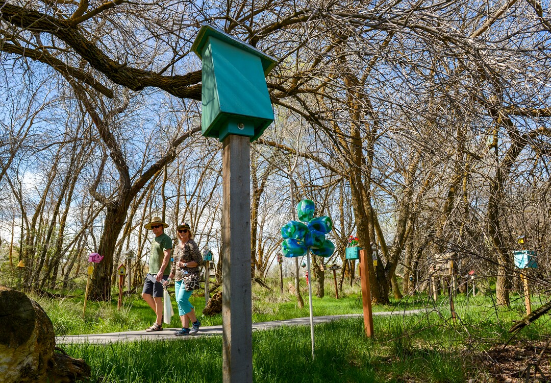 Leah Hogsten  |  The Salt Lake Tribune  Visitors to the Ogden Nature Center walk through the birdhouse trail to see the many eclectic birdhouses during Earth Day celebration, Saturday, April 20, 2019. 