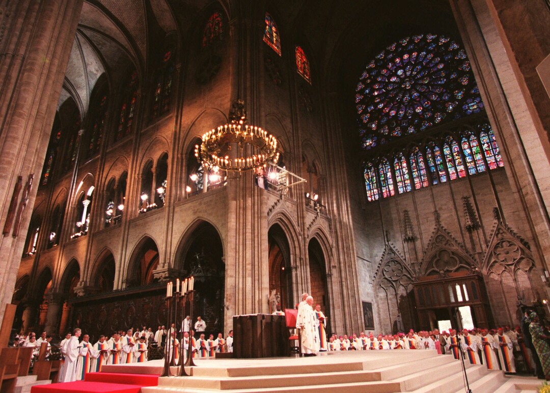 Pope John Paul II attends the celebration of a beatification mass at Notre Dame cathedral in Paris Friday Aug.22,1997. The 77-year-old pontiff celebrated the beatification for Frederic Ozanam, a 19th-century French layman who founded the St-Vincent-de-Paul charity. The pope is on a four-day official visit to France for the World Youth Day festivities. (AP Photo/Domenico Stinellis)
