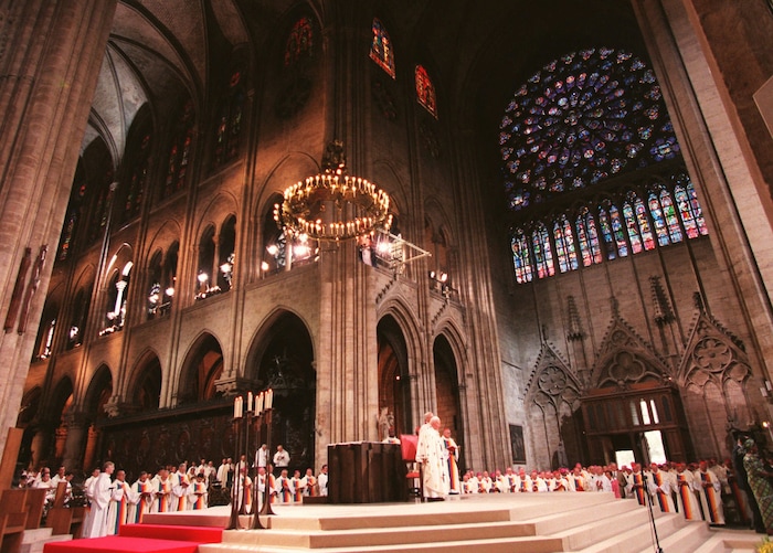 Pope John Paul II attends the celebration of a beatification mass at Notre Dame cathedral in Paris Friday Aug.22,1997. The 77-year-old pontiff celebrated the beatification for Frederic Ozanam, a 19th-century French layman who founded the St-Vincent-de-Paul charity. The pope is on a four-day official visit to France for the World Youth Day festivities. (AP Photo/Domenico Stinellis)