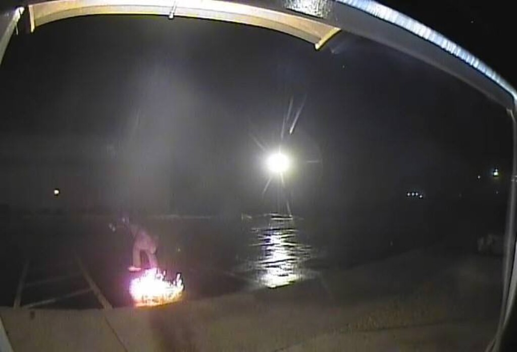 (Photo courtesy of the West Jordan Police Department) A small fire is captured by surveillance cameras during an attempted ATM robbery on Jan. 7. The two suspects were able to explode the cash machine, but the blast wasn't powerful enough to break into the cash vault.
