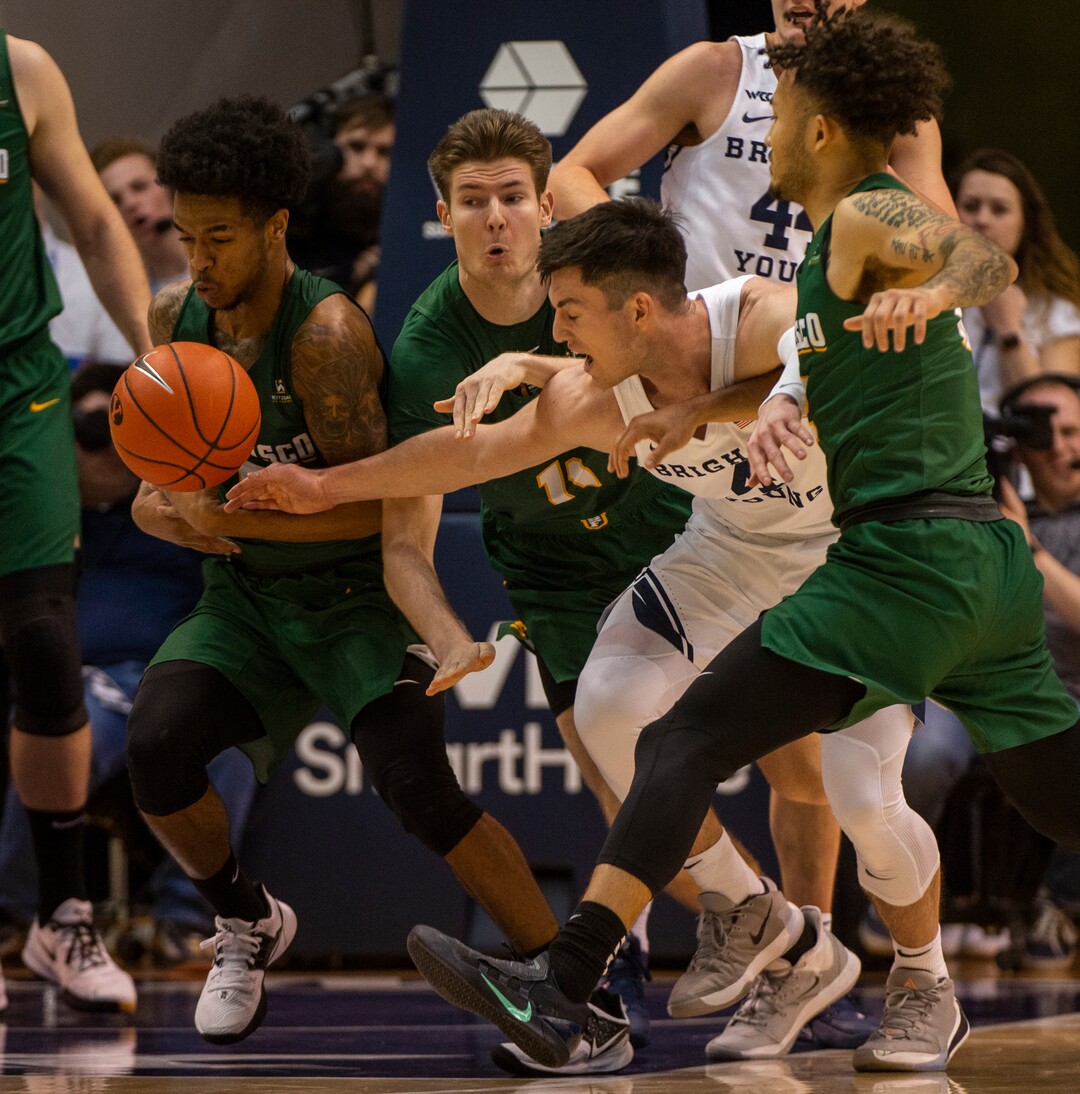 (Rick Egan  |  The Salt Lake Tribune)    Brigham Young Cougars guard Alex Barcello (4) goes for a loose ball along with San Francisco Dons guard Khalil Shabazz (0), in WCC basketball acton between the Brigham Young Cougars and the San Francisco Dons, at the Marriott Center, Saturday, Feb. 8, 2020.