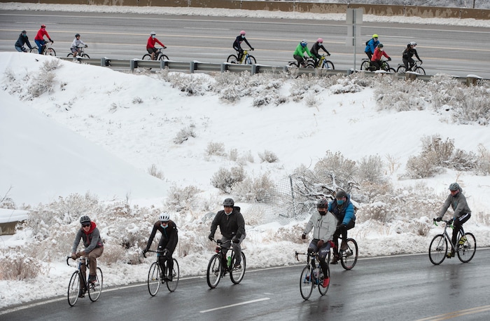 (Francisco Kjolseth  | The Salt Lake Tribune) People participate in a memorial bike ride along Wasatch Blvd in Salt Lake City on Sunday, Feb. 14, 2021, in honor of the four who died in an avalanche on Saturday, Feb. 6.