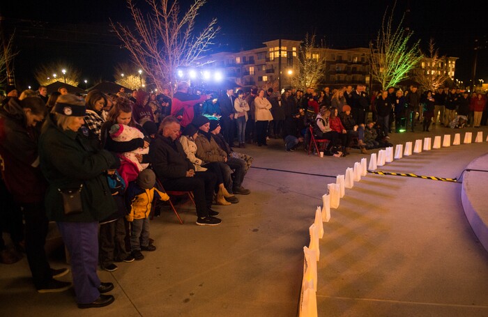 (Rick Egan  |  The Salt Lake Tribune)  Crowds pause for a moment of silence, during a memorial ceremony at Fairbourne Station Plaza in West Valley City, in remembrance of Cody Brotherson, who was killed in the line of duty one year ago today.  Monday, November 6, 2017.
