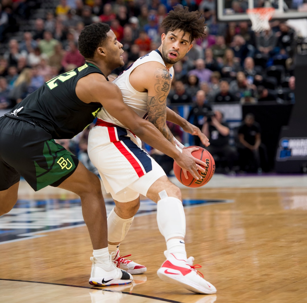 (Leah Hogsten  | The Salt Lake Tribune) Gonzaga Bulldogs guard Josh Perkins (13) is defended by Baylor Bears guard Jared Butler (12) as Baylor faces Gonzaga in the second round of the NCAA tournament in Salt Lake City on Saturday, March 23, 2019.