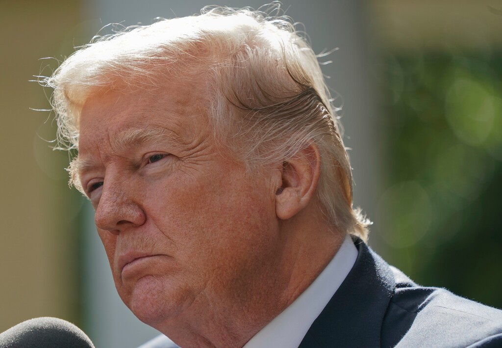 In this Oct. 16, 2017, photo, President Donald Trump listens to a questions prior to speaking to members of the media in the Rose Garden of the White House. Trump is proving to be an erratic trading partner as he kicks thorny policy issues to Congress and then sends conflicting signals about what he really wants. His rapid backpedal on a short-term health care fix this week is the latest example to leave Republicans and Democrats alike scratching their heads. (AP Photo/Pablo Martinez Monsivais)