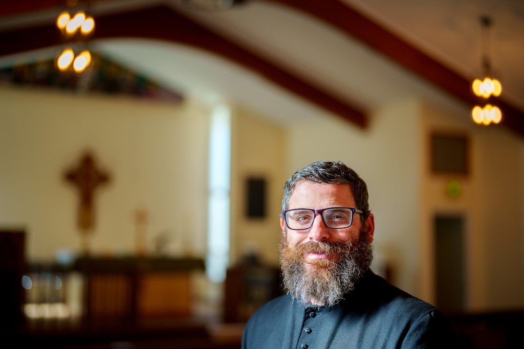 (Trent Nelson | The Salt Lake Tribune) Father James Linton at St. John's Anglican Church in Cottonwood Heights on Monday, Sept. 8, 2025. “I was,” the priest said, “completely blown away” by the offer — a chapel and the land it sat on, free and clear.