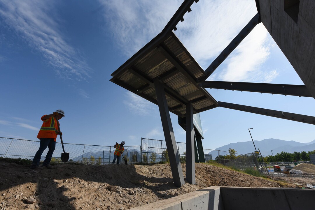 (Francisco Kjolseth  |  The Salt Lake Tribune) UDOT gives a tour of the state’s new longest pedestrian bridge on Thursday, August 20, 2020, connecting Utah Valley University in Orem to student housing and the community on the West side of I-15. Crews are finishing up an extensive hydronic heating system that will pump warm water to keep the bridge clear of snow in the winters, as it gets ready to pour concrete for the walking surface. UDOT will close I-15 in both directions this weekend for work on the nearly 1,000 foot bridge that is 15 feet wide to accommodate pedestrians, cyclists and scooters. Elevators and stairs with small ramps to push up bicycles will be on each side of the bridge.