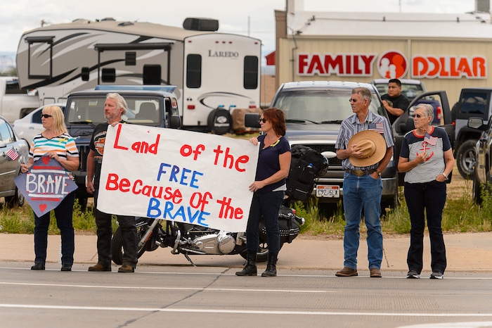(Trent Nelson | The Salt Lake Tribune)  Crowds line Main Street in Monticello to honor the motorcade of fallen soldier Aaron Butler, who was killed last week in Afghanistan, , Thursday August 24, 2017.