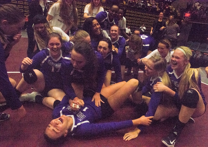 (Rick Egan  |  The Salt Lake Tribune)  The Box Elder Bees celebrate their state title after defeating the Bountiful Braves, in the 5A volleyball championship game, at Utah Valley University, Saturday, November 4, 2017.