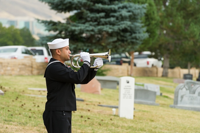 (Alex Gallivan  |  Special to The Tribune) Marine Pfc. Robert K. Holmes, who died 77 years ago aboard the USS Oklahoma during the attack on Pearl Harbor, is laid to rest in the Salt Lake City Cemetery, Monday, Aug. 20, 2018.