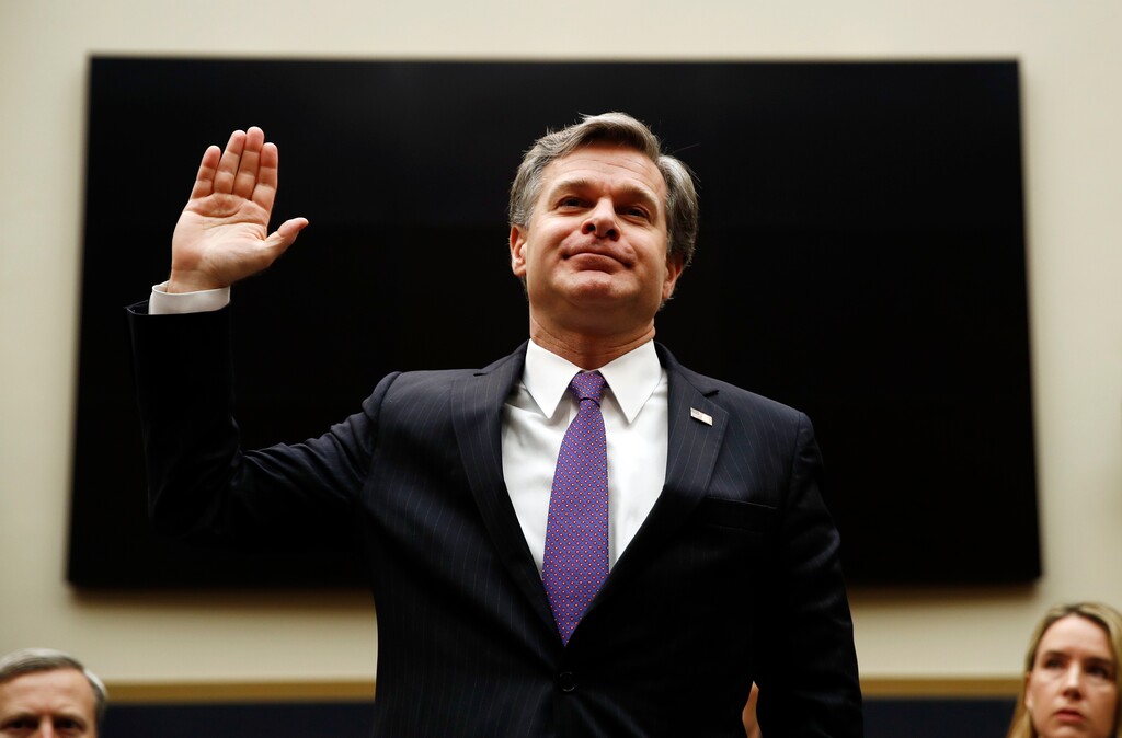 (AP Photo/Carolyn Kaster) FBI Director Christopher Wray is sworn in during a House Judiciary hearing on Capitol Hill in Washington, Thursday, Dec. 7, 2017.