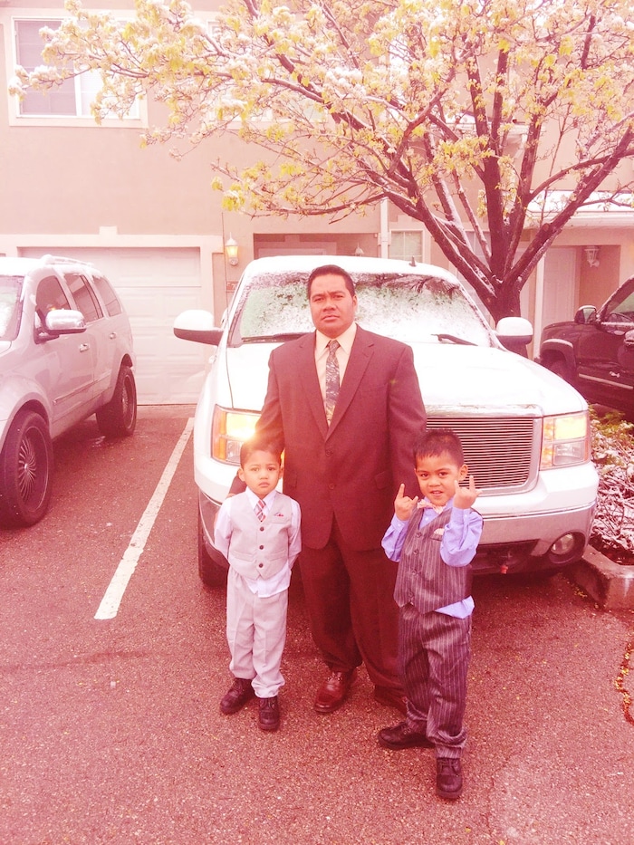 (Photo courtesy Sauelelee Manusina)  Aufanua Manusina, pictured here with two of his children, was deported to Samoa on Tuesday.