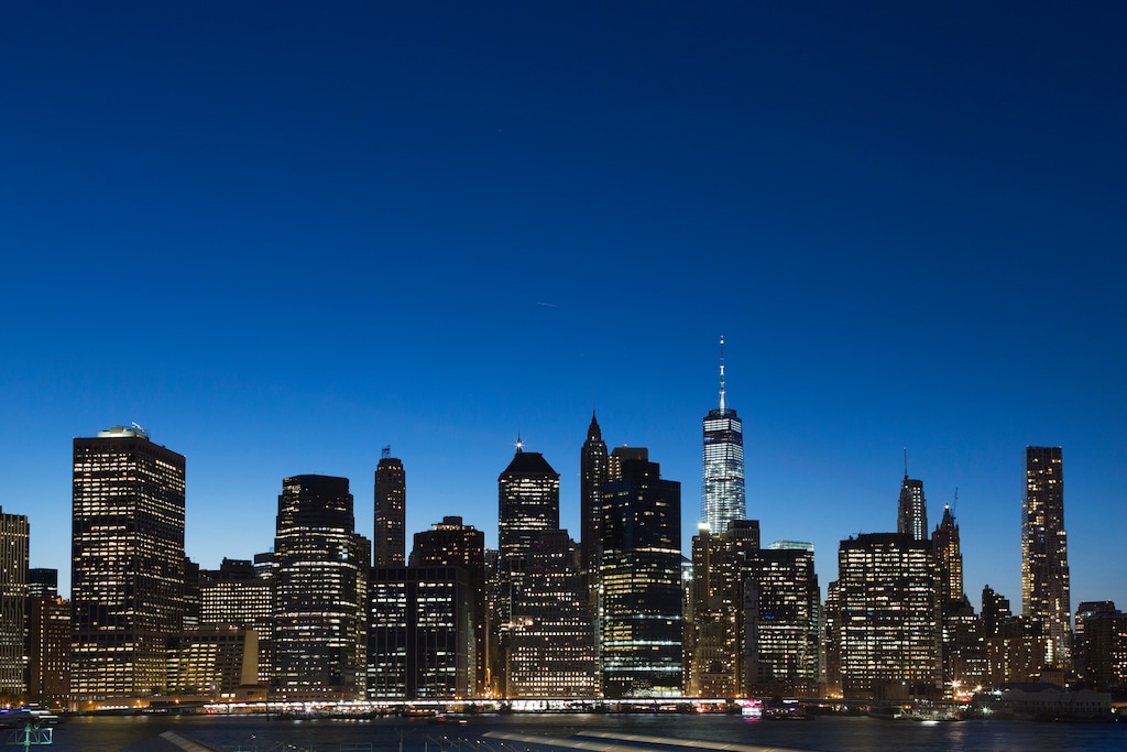 One World Trade Center, center right, towers above the lower Manhattan skyline, Friday, Aug. 28, 2015 in New York. (AP Photo/Mark Lennihan)