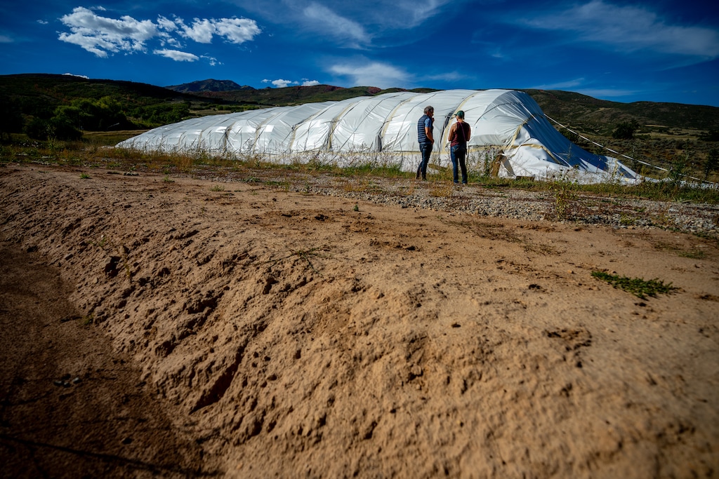 (Trent Nelson | The Salt Lake Tribune) A large snow pile covered with insulated material at Soldier Hollow in Midway on Thursday, Sept. 24, 2026.