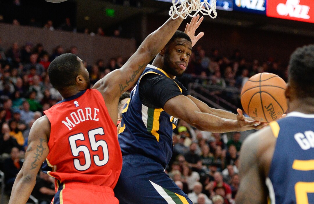 (Francisco Kjolseth  |  The Salt Lake Tribune)  New Orleans Pelicans guard E'Twaun Moore (55) puts pressure on Utah Jazz guard Emmanuel Mudiay (8) as the Utah Jazz host the New Orleans Pelicans in their NBA basketball game at Vivint Smart Home Arena in Salt Lake City on Sat. Nov. 23, 2019.