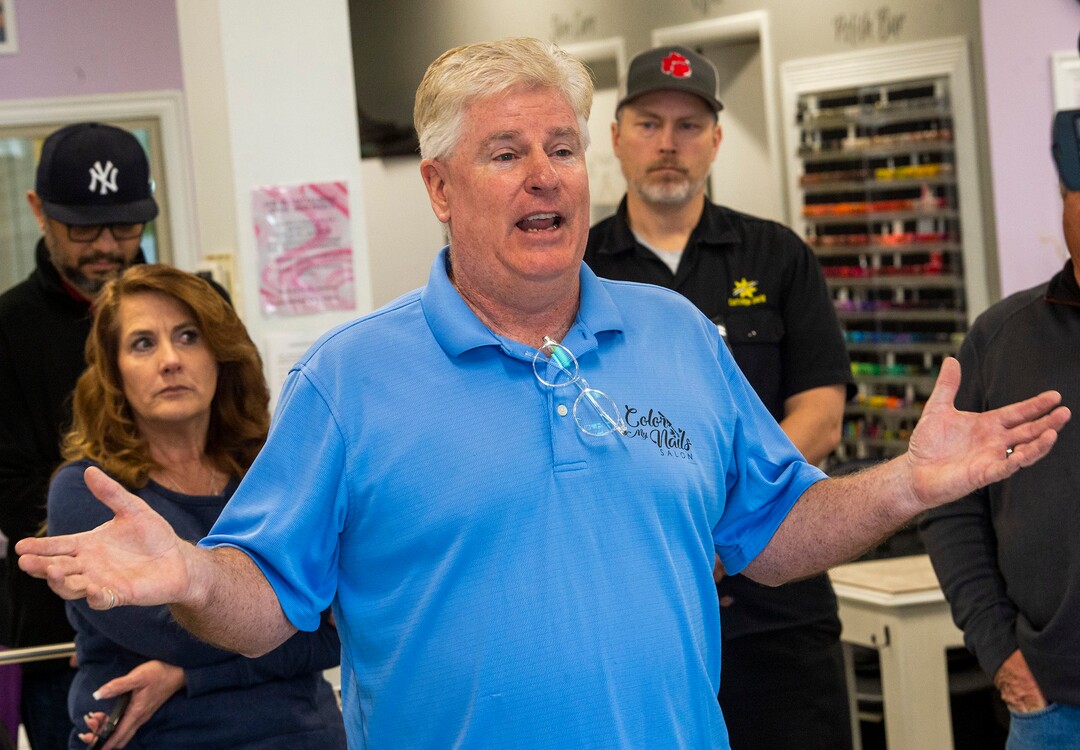 (Rick Egan  |  The Salt Lake Tribune)    Surrounded by other small business owners, Doug Jardine owner of Color My Nails Salon, talks about the impact COVID-19 is having on small businesses, during. news conference at his salon in Midvale, Wednesday, March 25, 2020.