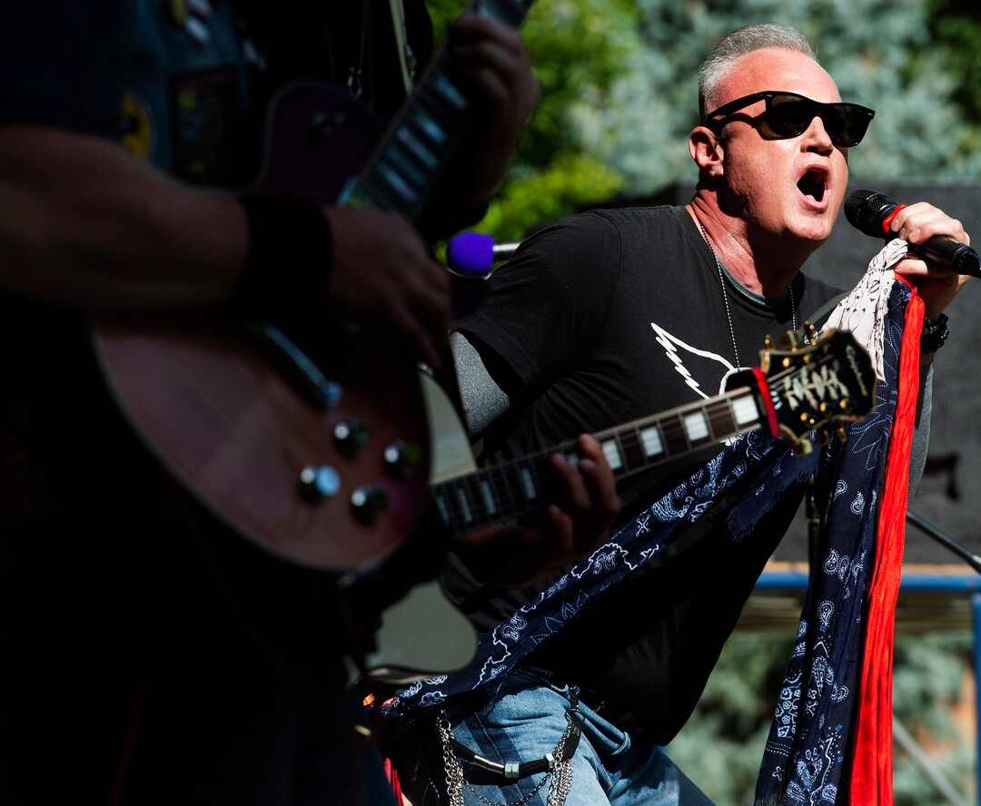 (Rick Egan  |  The Salt Lake Tribune)    Tracy Cowdell sings for the band Denovo, during the annual Geezerfest 2020 in Orem on Friday, Aug. 14, 2020.