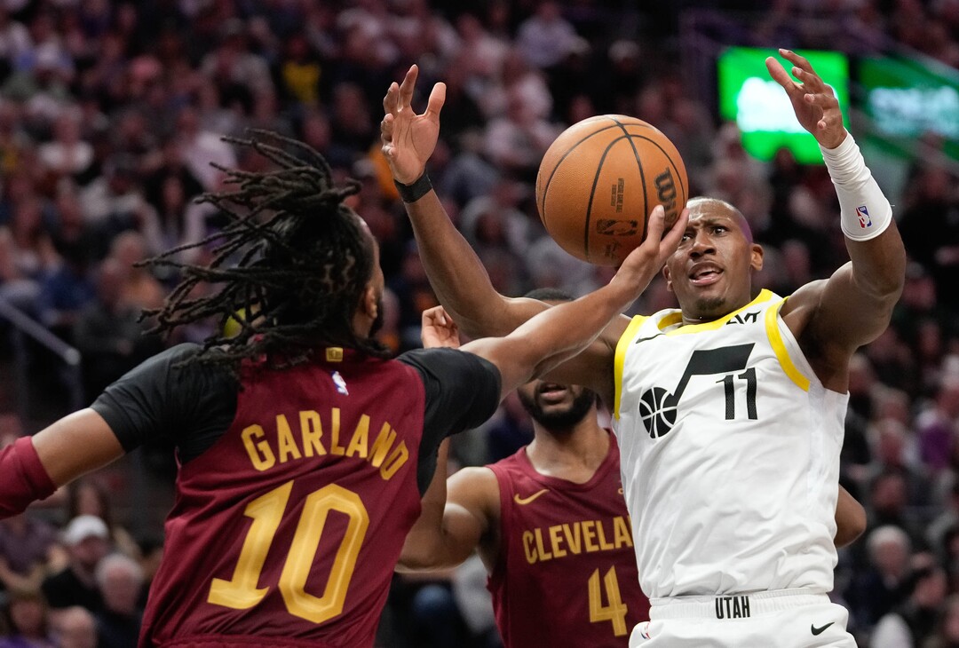 (Francisco Kjolseth  |  The Salt Lake Tribune) Utah Jazz guard Kris Dunn (11) is beat to a rebound by Cleveland Cavaliers guard Darius Garland (10) as the Utah Jazz host the Cleveland Cavaliers at the Delta Center in Salt Lake City on Tuesday, April 2, 2024.