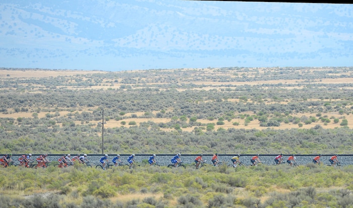 Al Hartmann | The Salt Lake Tribune
Peleton in the 4th stage of the Tour of Utah enters Rush Valley, the halfway point in the race. Nothing but sagebrush and heat. Stage 4 started in South Jordan went west into the west desert and finished back in South Jordan 123 miles later.